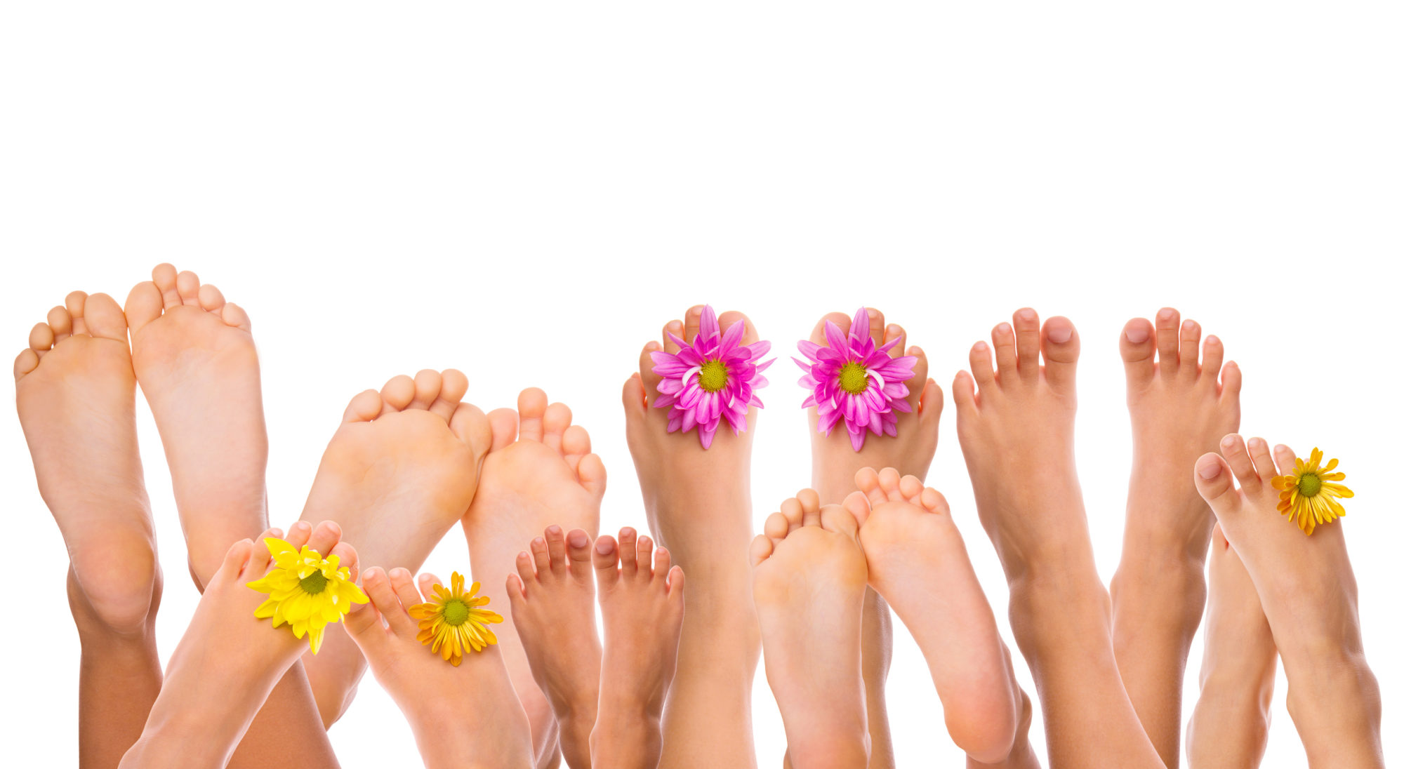 Füsse mit Blüten – Symbolbild für Fussreflexzonen-Massage und Bachblütentherapie